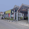 Отель OYO 90543 An-nur Guest House Syariah, фото 1