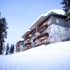 Отель Ski-Inn PyhäSuites в Пихатунтури