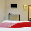 Отель OYO 91819 Larich Guest House, фото 7