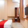 Отель Reddoorz Syariah Near Rs Mata Padang, фото 6