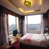 Отель Lijiang Mingyuan Boutique Inn, фото 1