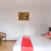 Отель OYO 2938 Penginapan Bumi Ahsan 102 Syariah, фото 13