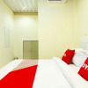 Отель OYO 90978 Khalifi Guesthouse Syariah, фото 6