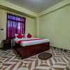 Отель OYO 11935 White Cloud Guest House, фото 9