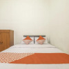 Отель OYO 2418 Sutanto Guest House, фото 6
