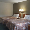 Отель Travelers Inn & Suites, фото 30