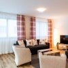 Отель TITLIS Resort Wohnung 111 в Энгельберге