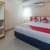 Отель OYO 1448 Mangga Dua Guest House, фото 14