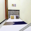 Отель OYO 92123 Chikam House Syariah, фото 13