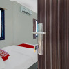 Отель OYO 91065 Guest House 19 Syariah, фото 15