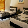 Отель Portside Whitsunday Hotel, фото 4
