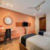 Отель Capital O 5829 Gardeenia Comforts Suites, фото 6
