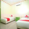 Отель OYO 2596 Homestay Hj. Suharti, фото 6