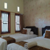 Отель Majapahit Homestay Syariah, фото 4