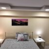 Отель sunmer apartment 1minute from sea, 15 min from the airport, фото 9