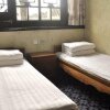 Отель Fanzhai Hostel, фото 6