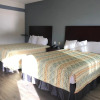 Отель Big Lake Inn & Suites, фото 4