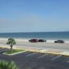 Отель By The Sea Gulf View Deluxe Condo, фото 13