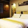 Отель Nanjing Tulou Herongzhuang Inn, фото 5