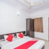 Отель OYO 13941 NR Suites, фото 7