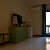 Отель 43&13 Room Store B&B в Тайнани
