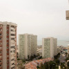 Отель Vibrant Flat Near Trendy Attractions in Karsiyaka, фото 1