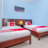 Отель OYO 2450 Hening Homestay Near Pantai Tanjung Bias, фото 8