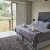 Отель Cheerful 3-bedroom home in Zimbali Wedge Estate, фото 1