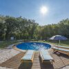 Отель Holiday house with private pool for 6-8 persons in the holiday park Jelovci, фото 3