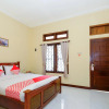 Отель OYO 2864 Mangsit Garden Homestay, фото 3