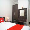 Отель Oyo 2038 Jasmine Guest House Balikpapan, фото 9