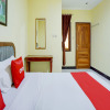 Отель OYO Life 3956 Hotel Palem 2 Syariah, фото 24