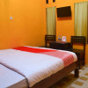 Отель OYO 1145 Rita Guesthouse, фото 6