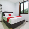 Отель RedDoorz Syariah near DBL Arena 2, фото 4