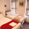 Отель Deluxe Three bed Suite in Liverpool City Center, фото 6