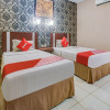 Отель OYO 3936 Hotel Trisula Makassar, фото 8