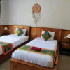 Отель Putu's Paradise Guesthouse, фото 6