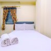 Отель Comfort And Cozy Living 2Br At Cibubur Village Apartment, фото 13