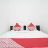 Отель OYO 445 Lavender Homestay Syariah, фото 14