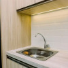 Отель Homey And Cozy Living Studio Apartment At B Residence, фото 8