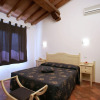 Отель Semi-Detached Holiday Home with AC in the South of Tuscany, фото 9