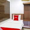 Отель OYO 90221 Makarim Guest House Syariah, фото 8