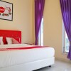 Отель Delima Guest House Syariah by OYO Rooms, фото 2