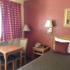 Отель Bluebird Day Inn & Suites, фото 10