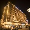 Отель Magnotel Jining Jiaxiang, Zengzi Avenue Hotel, фото 1