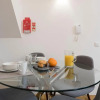 Отель LovelyStay - Cozy Duplex with Patio right off train&metro station, фото 14