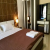 Отель OYO 75504 Ratchapruek Apartment Angthong, фото 16
