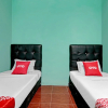 Отель Homestay 22 Syariah by OYO Rooms, фото 15