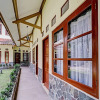 Отель Collection O 90461 Graha Atmadja Syariah Guest House, фото 1