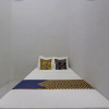 Отель SPOT ON 92828 Galih Kost 1 Syariah, фото 6